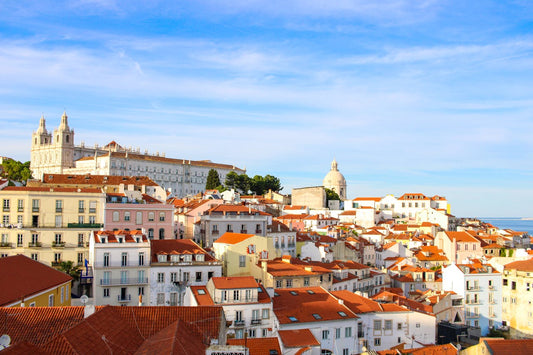 eSIM Portugal; scenic cityscape in Portugal under a blue sky.