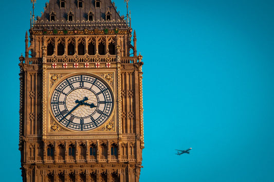 eSIM for UK; photo of the clock on Big Ben in the UK with a blue sky in the background.