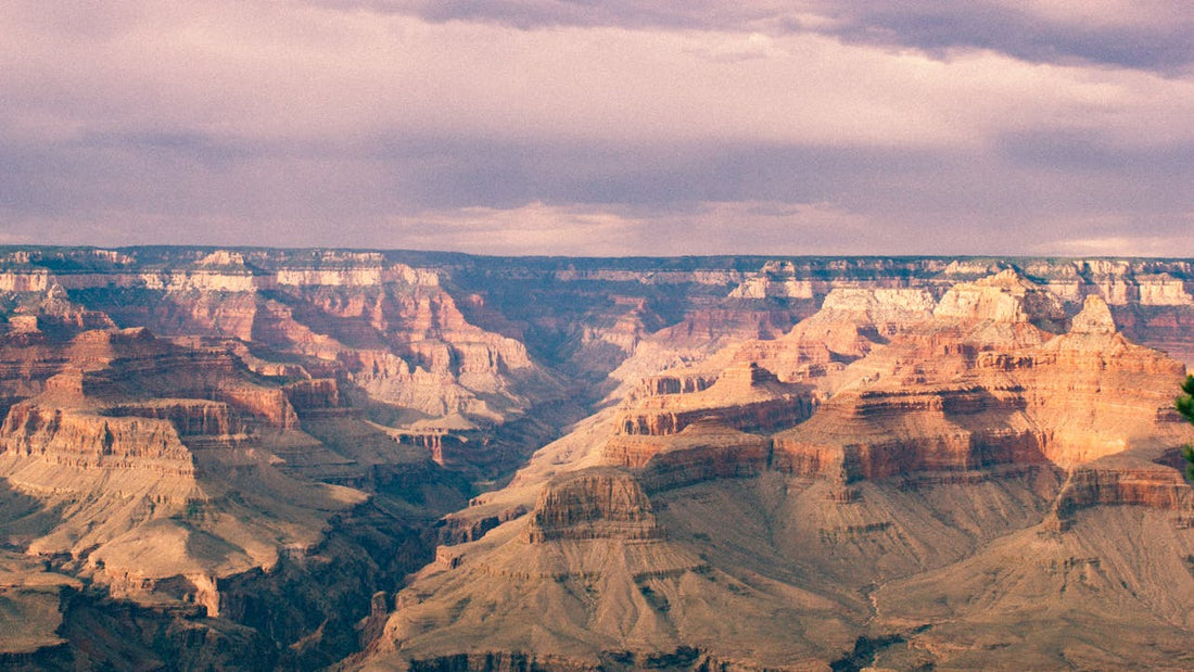 eSIM for USA travel; a photo of the Grand Canyon in Arizona, USA under a cloudy sky.