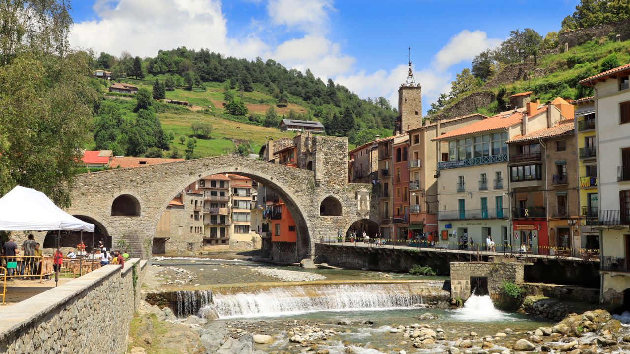 Best Andorra eSIM plan for travel - photo of scenic mountain village with a river running through it in Andorra