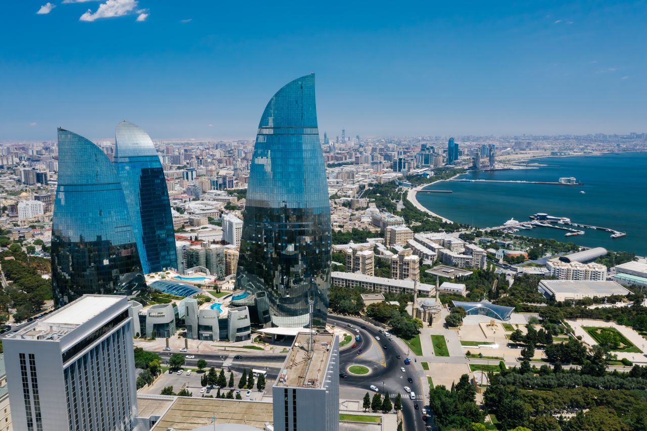 Best Azerbaijan eSIM for travel - photo of downtown Baku with the seashore showing in the distance.