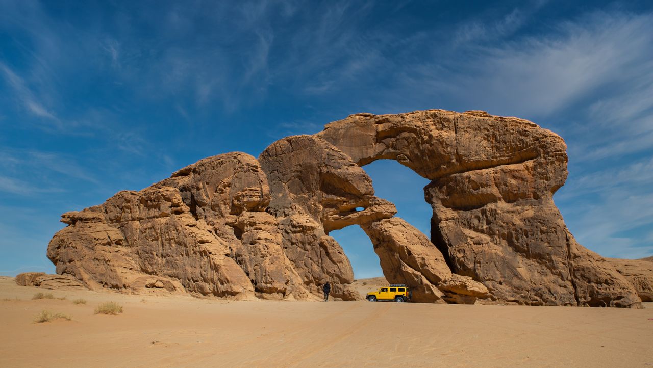 Best eSIM for Chad; a large desert rock formation in Chad