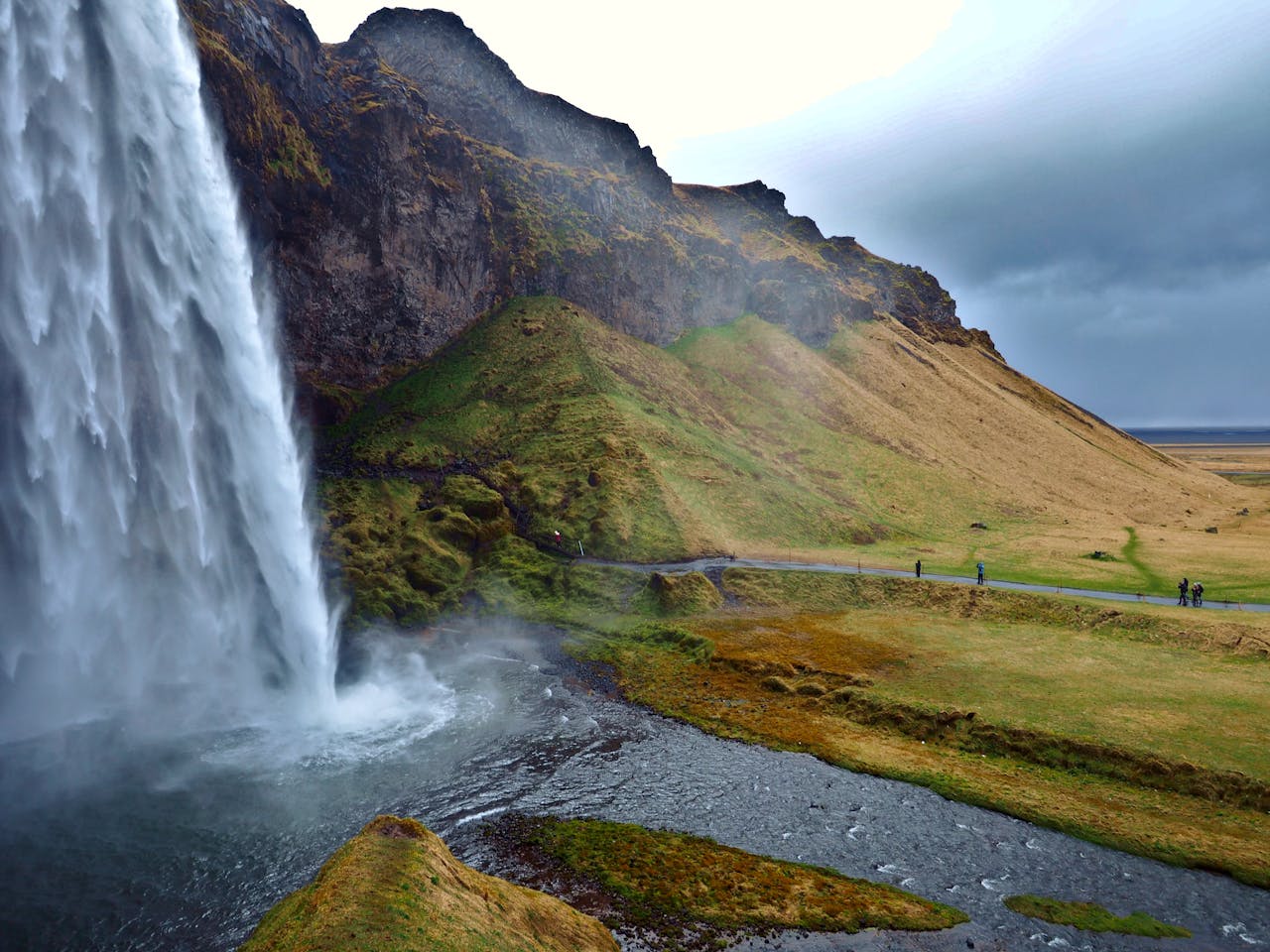 Iceland eSIM plans for travel - photo of Iceland's mountains and waterfall