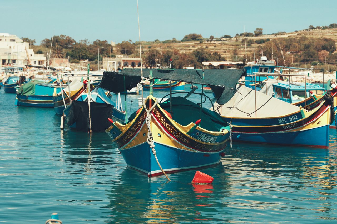 Best Malta eSIM plan for travel - photo of traditional Malta boats in harbour