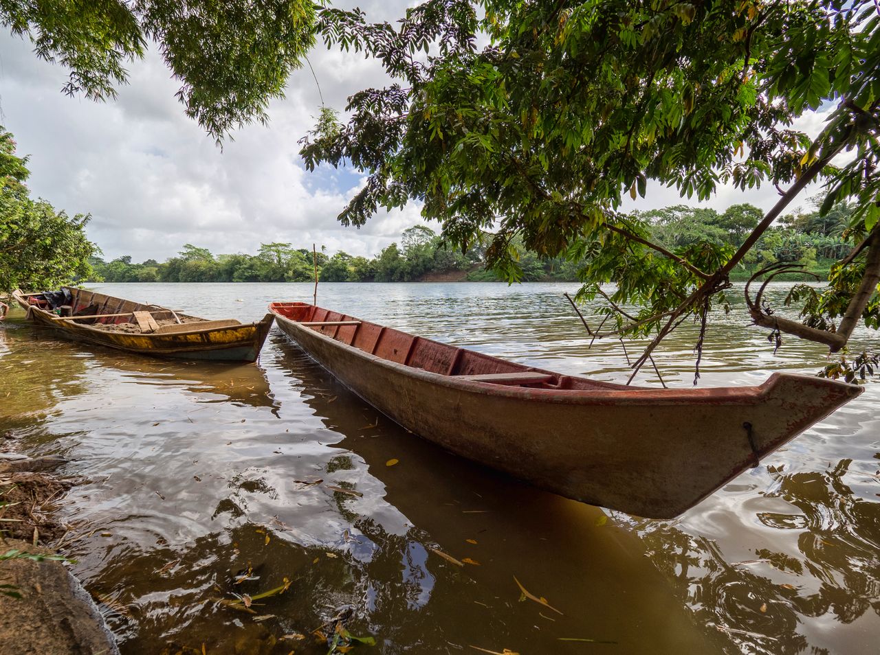 Best Nicaragua eSIM - photo of canoes along a jungle river in Nicaragua