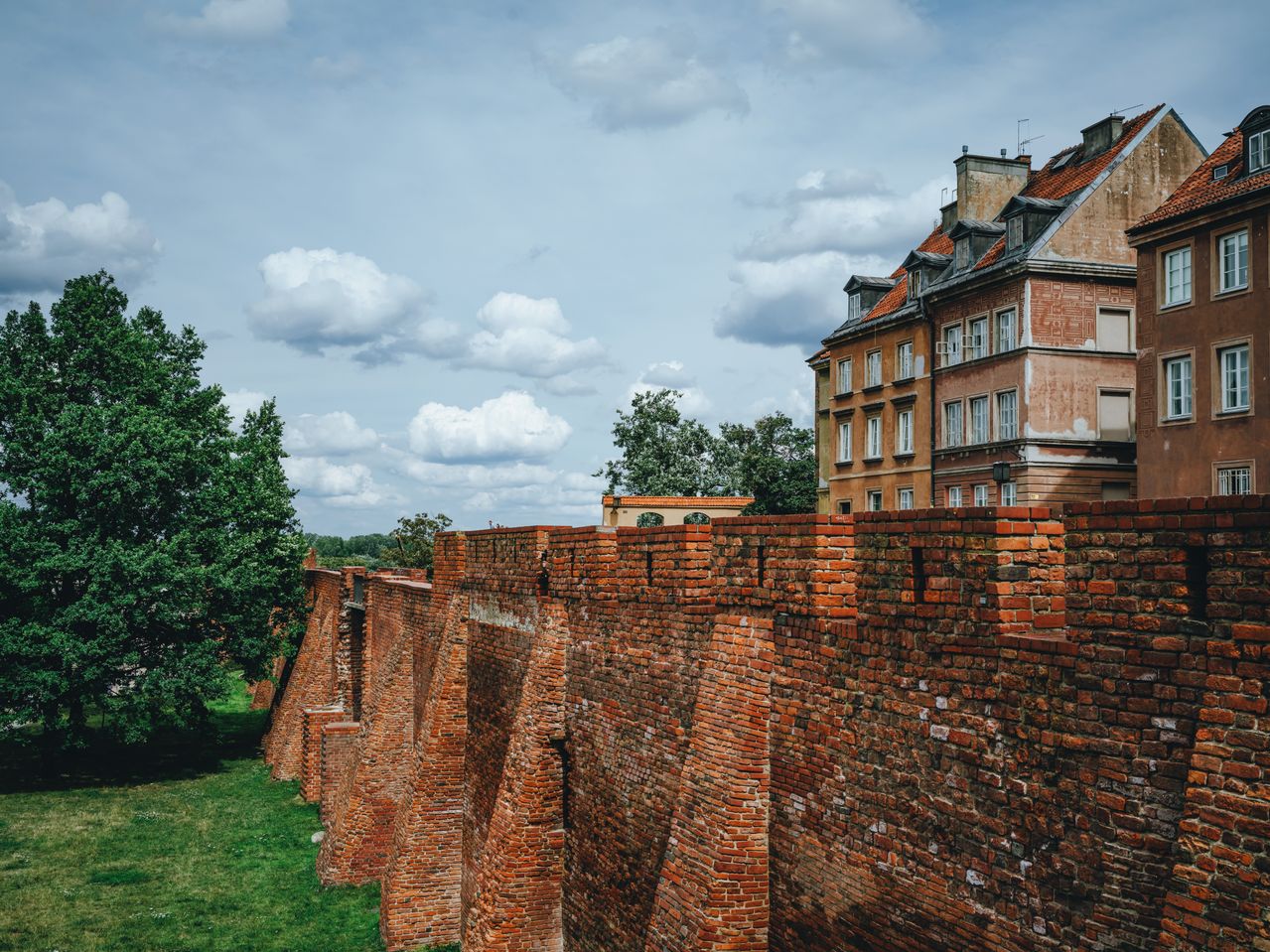 Best Poland eSIM for travel - photo of ancient fortress walls and town in Poland.