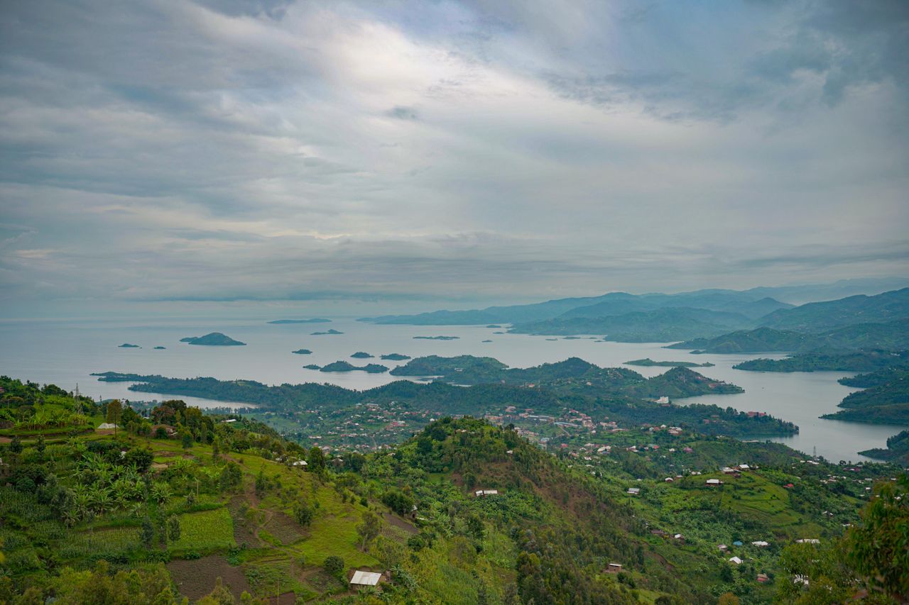 Best Rwanda eSIM for travel: a scenic  photograph of a vast body of water filled with numerous islands in Rwanda.
