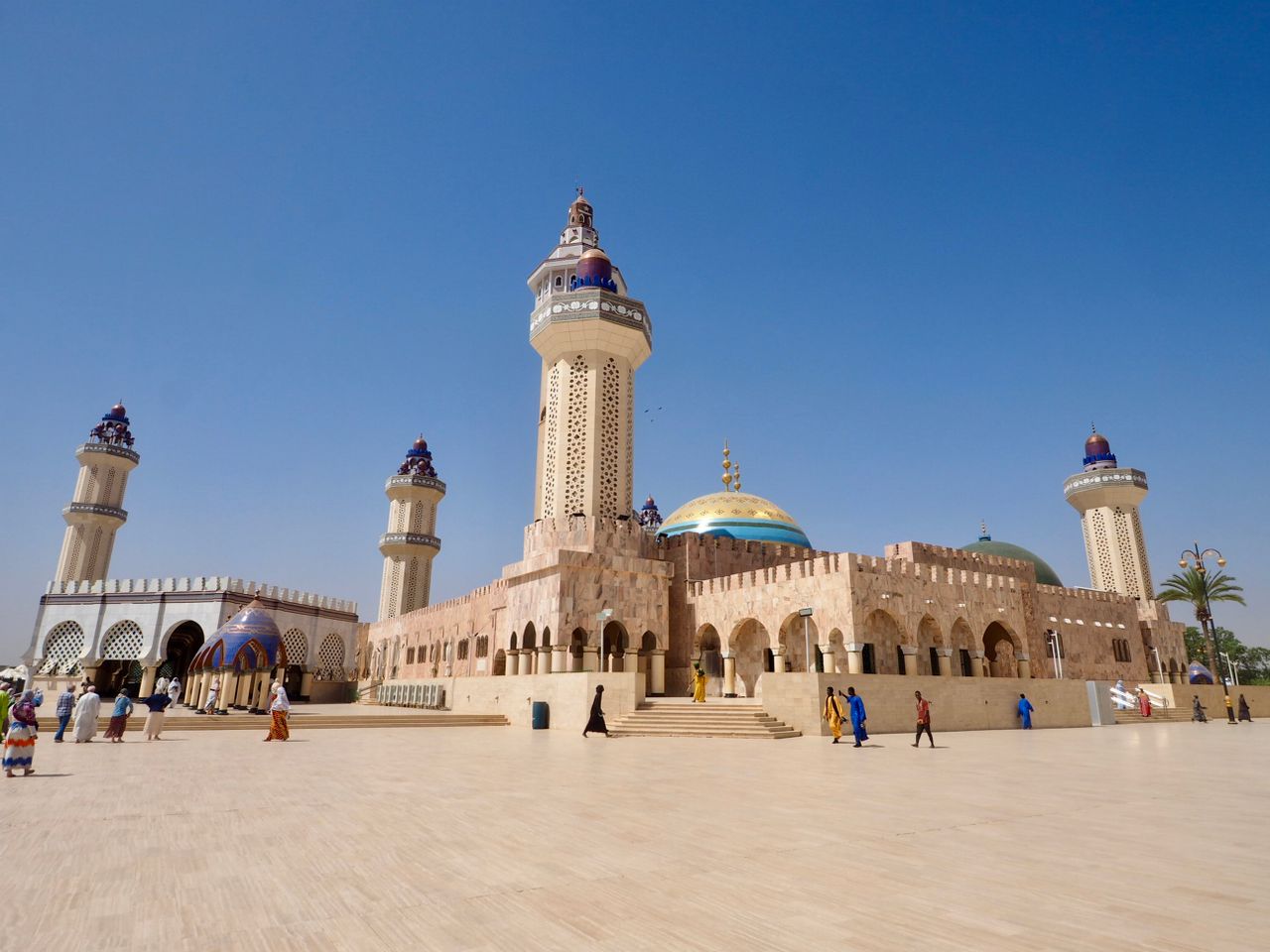 Tanzania eSIM plans for travel - photo of a large mosque with multiple minarets under a clear blue sky